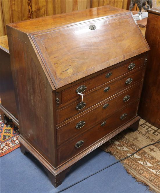 A George III inlaid mahogany bureau W.97cm